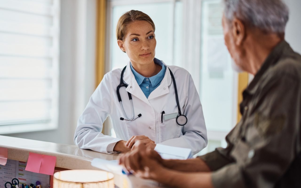 female-doctor-talking-to-senior-patient